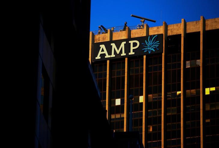 © Reuters. FILE PHOTO: The logo of AMP Ltd, Australia's biggest retail wealth manager, adorns their head office located in central Sydney, Australia