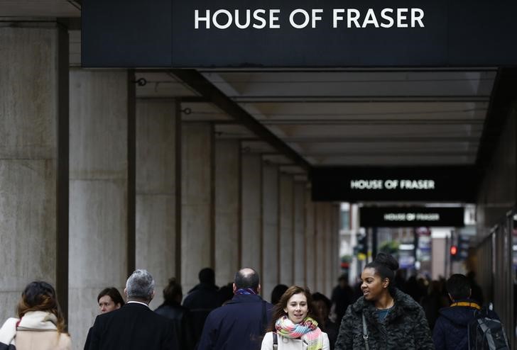 © Reuters. People walk past a House of Fraser store in central London