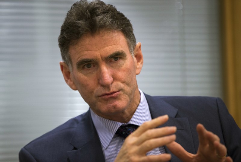 © Reuters. FILE PHOTO:  Royal Bank of Scotland chief executive Ross McEwan speaks during an interview with Reuters at Canary Wharf in London