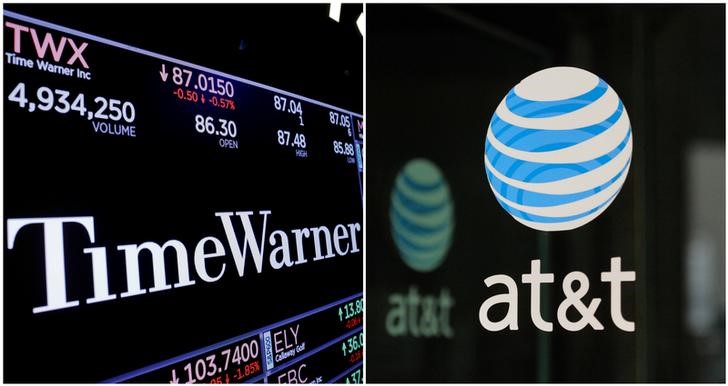 © Reuters. FILE PHOTO: A combination photo of the Time Warner shares price at the New York Stock Exchange and AT&T logo in New York