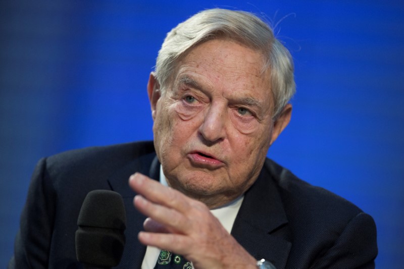 © Reuters. FILE PHOTO: Soros Fund Management Chairman Soros speaks during panel discussion at Nicolas Berggruen Conference in Berlin