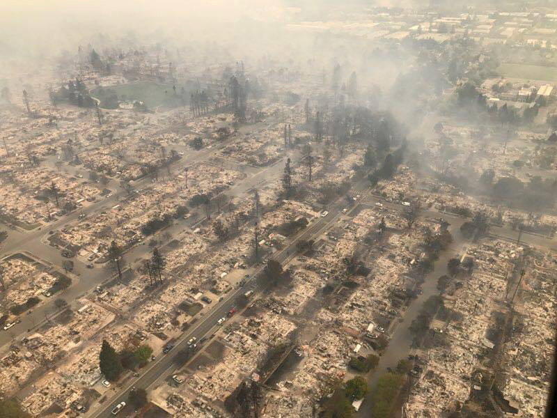 © Reuters. FILE PHOTO: Handout photo of an aerial photo of the devastation left behind from the North Bay wildfires north of San Francisco