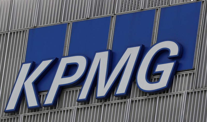 © Reuters. FILE PHOTO: The KPMG logo is seen at their offices at Canary Wharf financial district in London