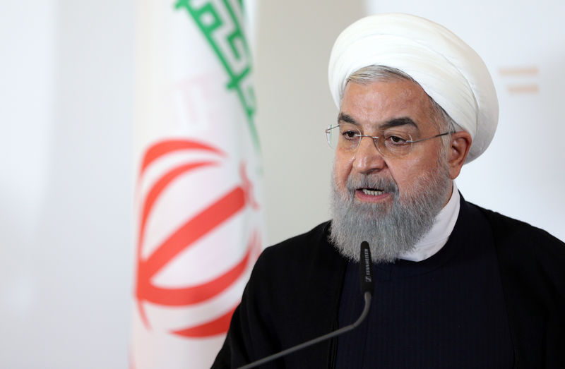 © Reuters. Iran's President Hassan Rouhani attends a news conference at the Chancellery in Vienna