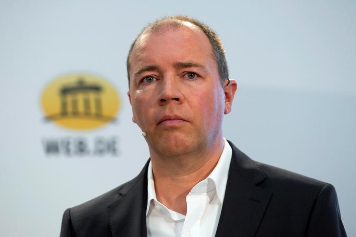 © Reuters. FILE PHOTO: United Internet CEO Dommermuth attends a news conference to present a joint initiative for encrypted email with Deutsche Telekom in Berlin