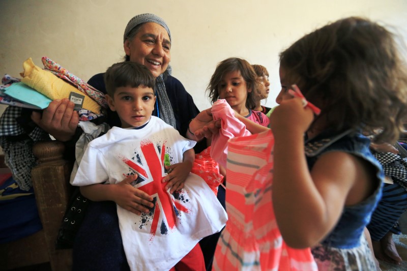 © Reuters. جدة عراقية ترعى 22 حفيدا بعد أن قتلت الدولة الإسلامية أباءهم