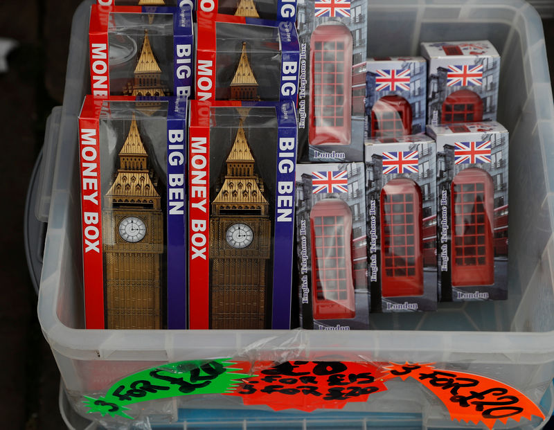 © Reuters. Big Ben themed money boxes are seen for sale at a souvenir stall in London