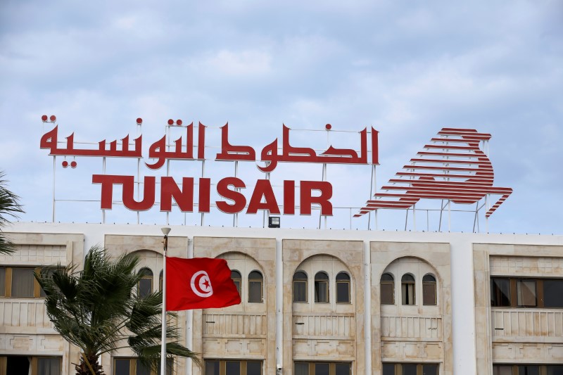 © Reuters. FILE PHOTO: A Tunisair sign is seen at their headquarters in Tunis