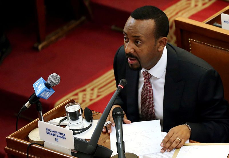 © Reuters. FILE PHOTO: Ethiopia's newly elected Prime Minister Abiy Ahmed addresses the members of parliament inside the House of Peoples' Representatives in Addis Ababa