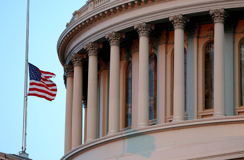 © Reuters. A flag flies at half staff in honor of Senator John McCain (R-AZ) at the U.S. Capitol in Washington