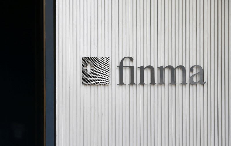 © Reuters. FILE PHOTO: The logo of Swiss Financial Market Supervisory Authority FINMA is seen outside their headquarters in Bern