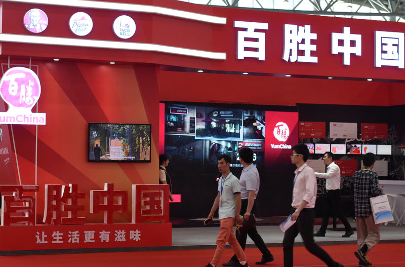 © Reuters. The booth of fast food restaurant company Yum China Holdings Inc. is seen at an investment and trade fair in Hefei, Anhui