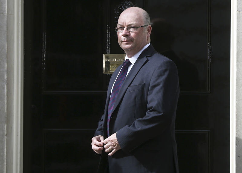 © Reuters. FILE PHOTO: Alistair Burt arrives at 10 Downing Street as Britain's re-elected Prime Minister David Cameron names his new cabinet in London