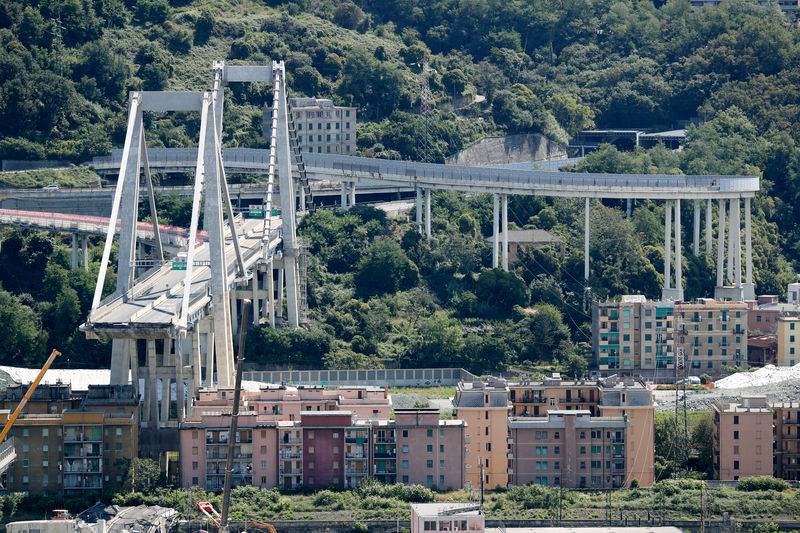 © Reuters. Il ponte Morandi in una vista aerea dopo il crollo