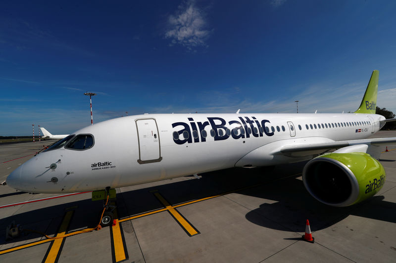 © Reuters. AirBaltic Airbus A220-300 aircraft is seen at the Riga International Airport