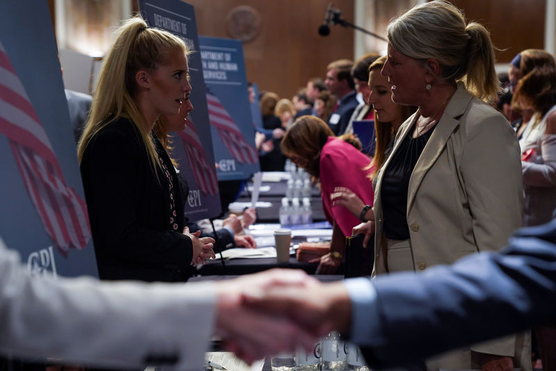 © Reuters. People attend the Executive Branch Job Fair hosted by the Conservative Partnership Institute at the Dirksen Senate Office Building in Washington