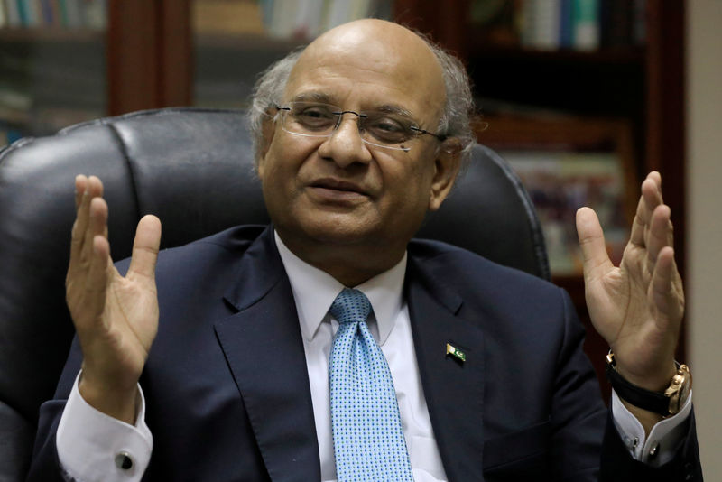 © Reuters. Ashfaque Hasan Khan, a member of Economic Advisory Council (EAC) gestures during an interview with Reuters in Islamabad