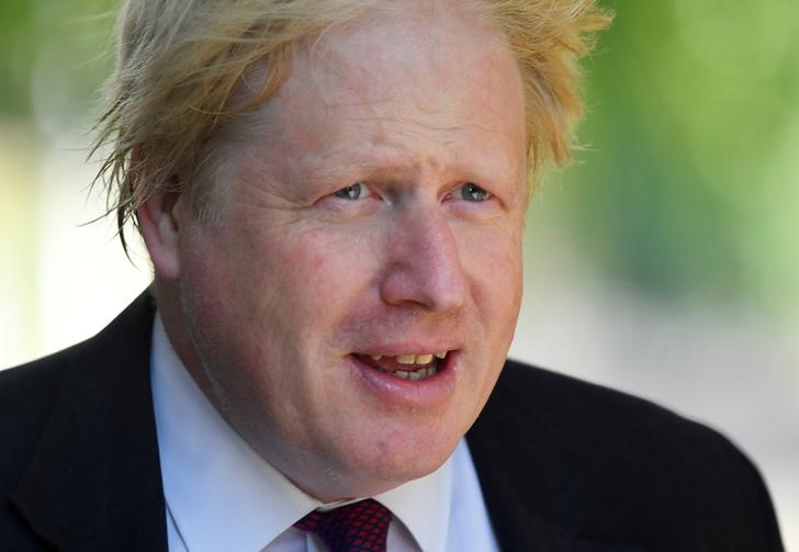 © Reuters. FILE PHOTO: Britain's Foreign Secretary Boris Johnson walks to Downing Street in London