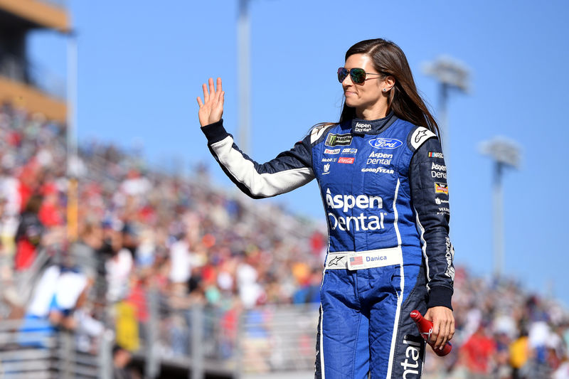 © Reuters. FILE PHOTO: NASCAR Cup Series driver Patrick waves before the Ford EcoBoost 400 in Homestead