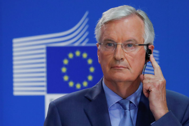 © Reuters. FILE PHOTO: European Union's chief Brexit negotiator Michel Barnier listens to a translation during a news conference in Brussels