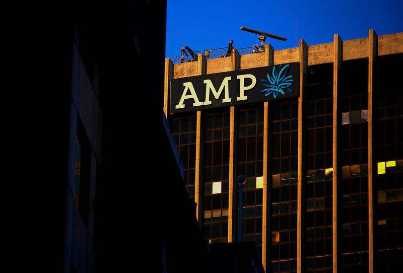 © Reuters. FILE PHOTO: The logo of AMP Ltd, Australia's biggest retail wealth manager, adorns its head office located in central Sydney, Australia