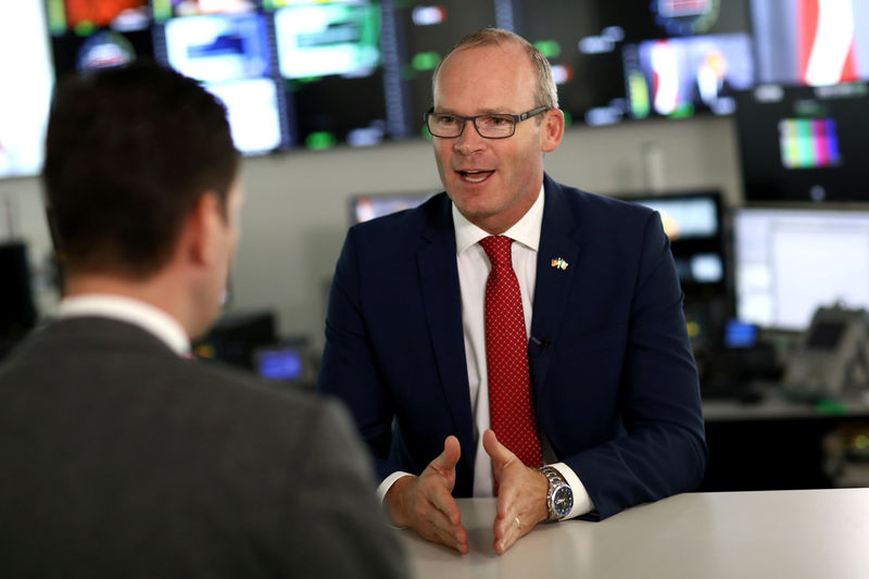 © Reuters. Irish Foreign Minister Simon Coveney answers journalists' questions during a Reuters interview in Berlin