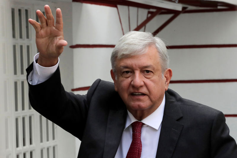 © Reuters. Mexico's President-elect Andres Manuel Lopez Obrador waves while arriving to his campaign headquarters in Mexico City