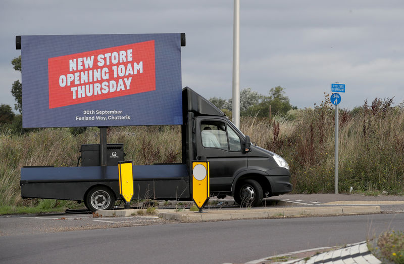 © Reuters. A van parked close to the Tesco's mothballed store in Chatteris Cambridgeshire, advertising the opening of a new store that is thought to be Tesco's first discount store trading under the new name Jack's, in Chatteris