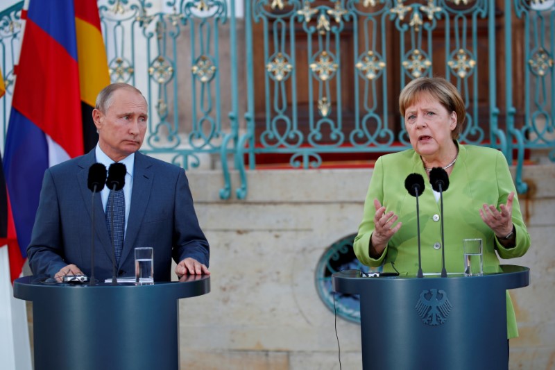 © Reuters. الكرملين: بوتين وميركل ناقشا هاتفيا الأوضاع في سوريا وأوكرانيا