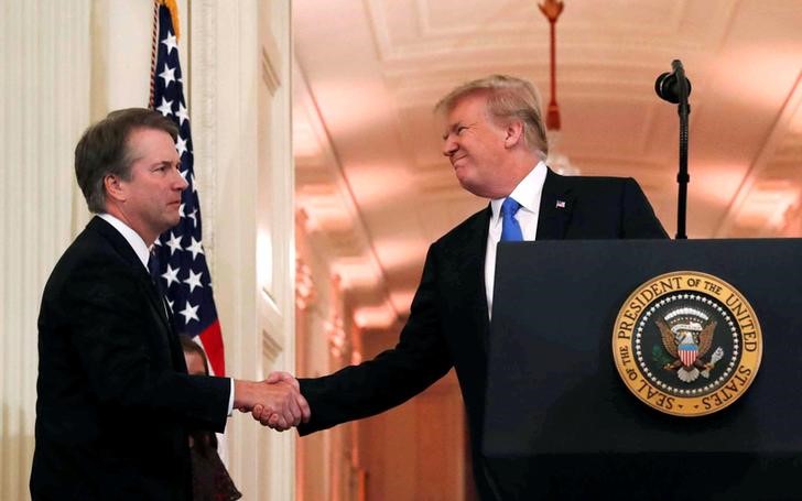 © Reuters. FILE PHOTO: U.S. President Donald Trump introduces his Supreme Court nominee judge Brett Kavanaugh in the East Room at the White House in Washington