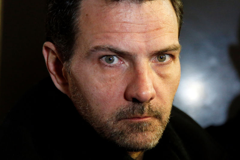 © Reuters. FILE PHOTO: Former trader Jerome Kerviel leaves the courthouse in Paris, France