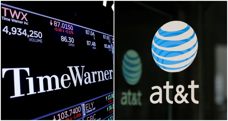 © Reuters. FILE PHOTO: FILE PHOTO: A combination photo of the Time Warner shares price at the New York Stock Exchange and AT&T logo in New York