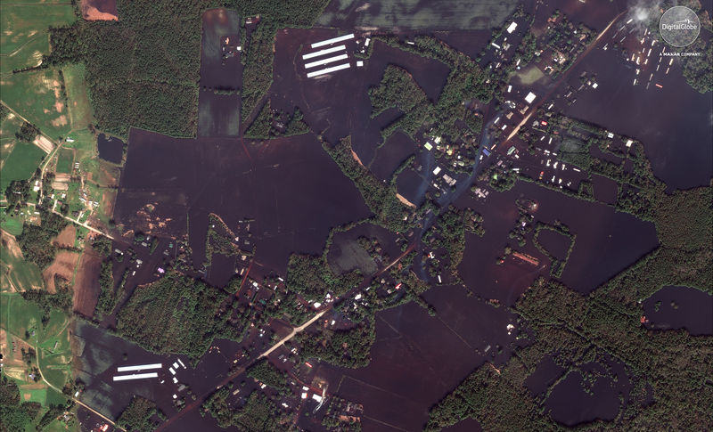 © Reuters. Flooded roads farms and homes are seen in this satellite image over the area surrounding Wallace