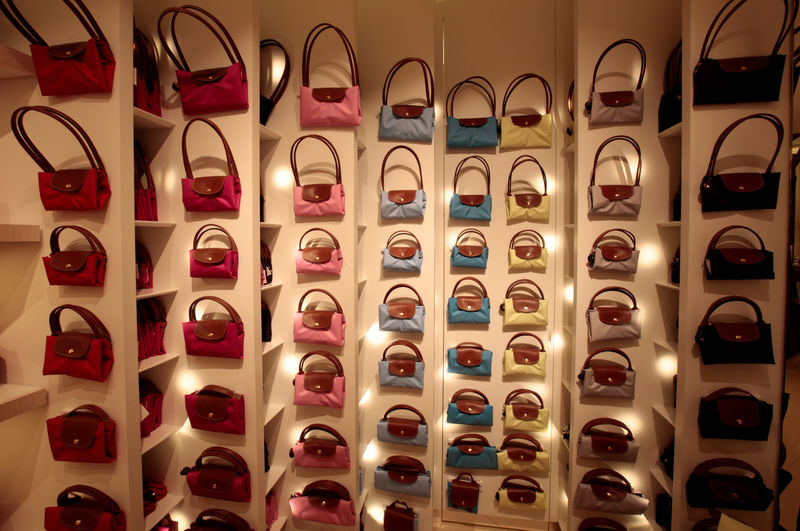 © Reuters. FILE PHOTO: Pliage bags of French luxury brand Longchamp are seen in a shop during the inauguration of the commercial zone at the Nice international airport Terminal in Nice