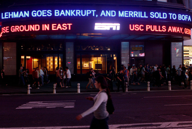 © Reuters. FILE PHOTO: File image of Lehman Brothers name moving across a news ticker in New York's Times Square