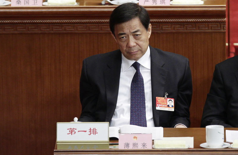 © Reuters. Former China's Chongqing Municipality Communist Party Secretary Bo Xilai pauses as he attends a plenary meeting of China's parliament, the National People's Congress, at the Great Hall of the People in Beijing