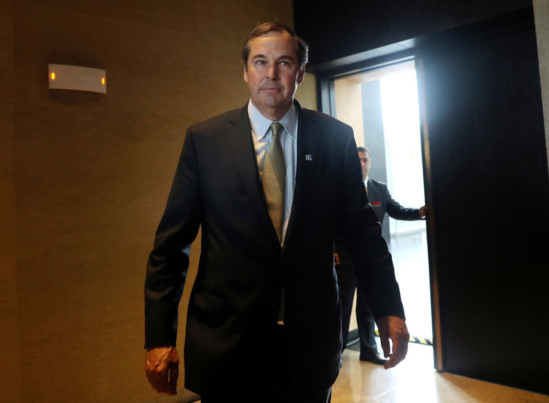 © Reuters. FILE PHOTO: Overseas Private Investment Corporation President and CEO Washburne walks by at the Americas Business Summit in Lima