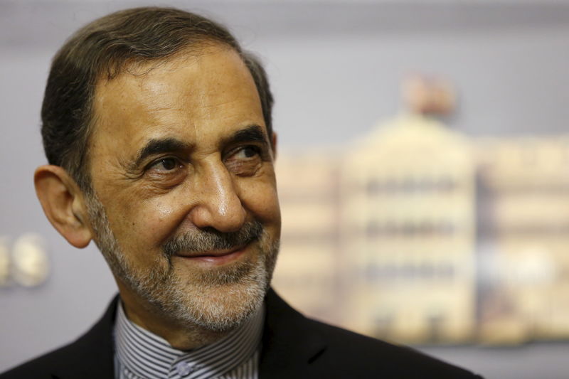 © Reuters. Ali Akbar Velayati smiles as he listens to questions from the media during a news conference in Beirut