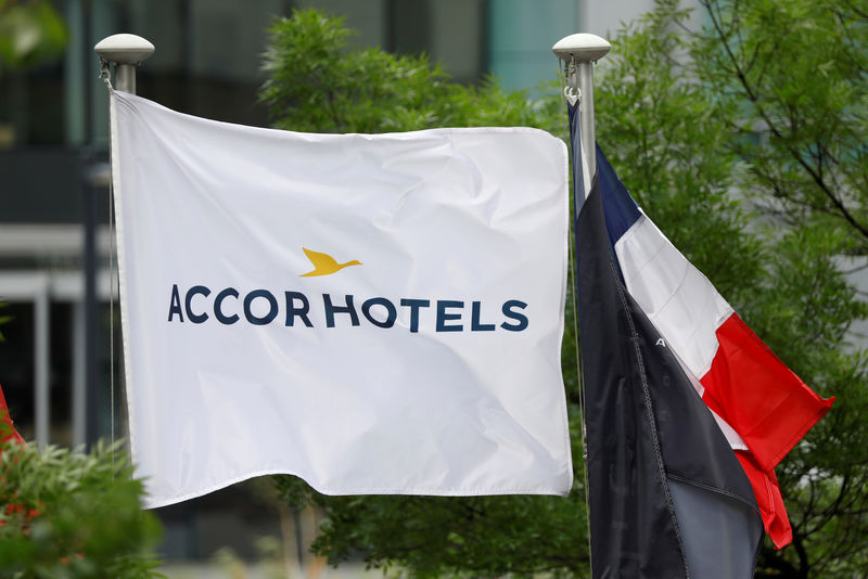 © Reuters. FILE PHOTO: The logo of France's AccorHotels on a flag at a business district near Paris