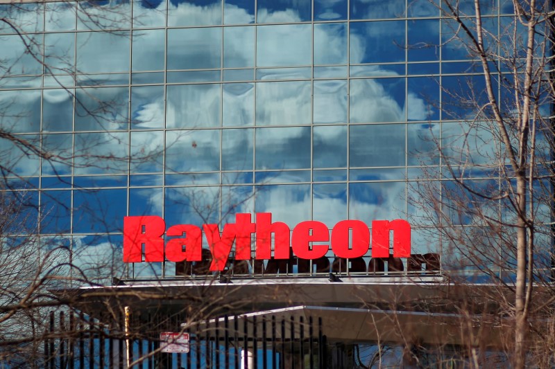 © Reuters. FILE PHOTO: A sign marks the Raytheon offices in Woburn