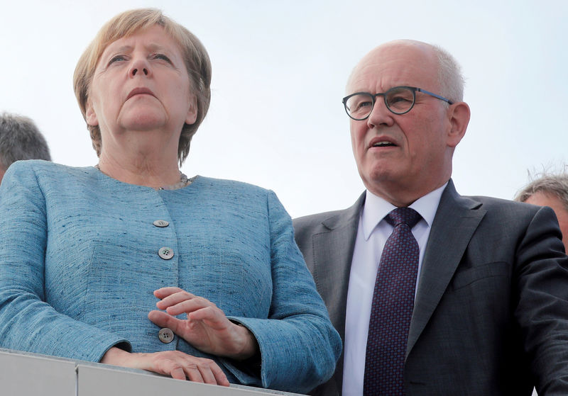 Image result for German conservatives' new floor leader downplays blow to Merkel