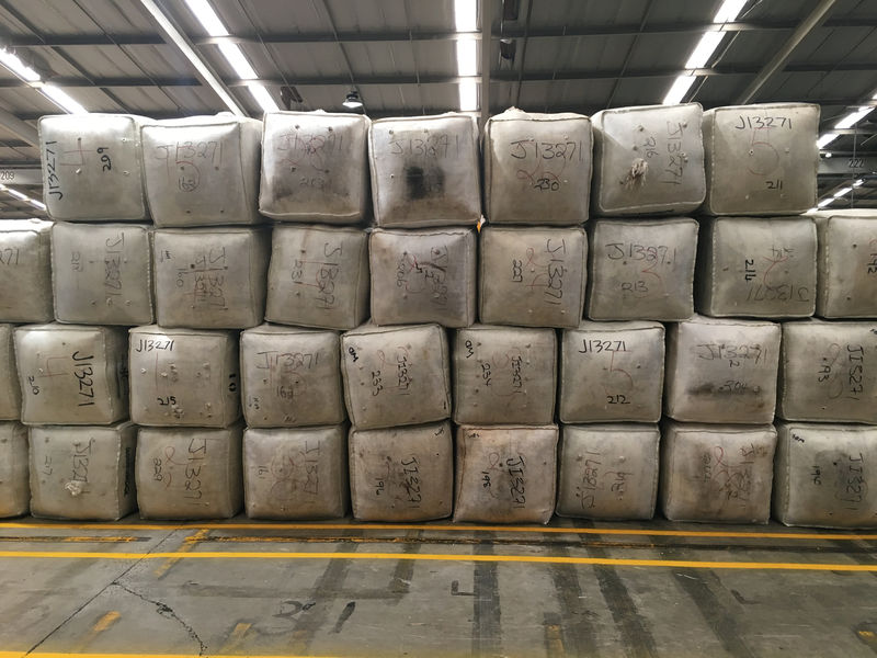 © Reuters. Wool bales stacked up and ready to be loaded into containers for export are pictured in Sydney