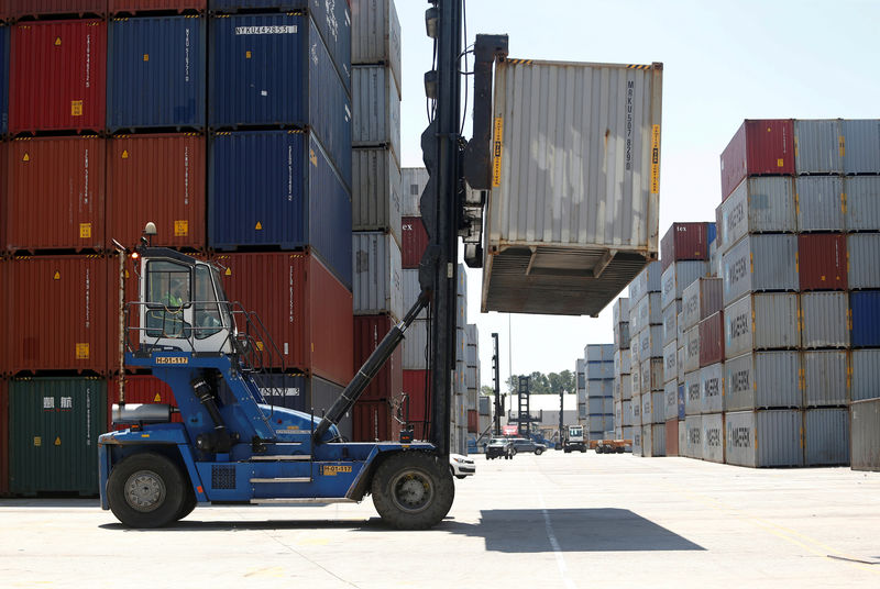 © Reuters. FILE PHOTO: Empty shipping containers are stacked for storage at Wando Welch Terminal operated by the South Carolina Ports Authority in Mount Pleasant