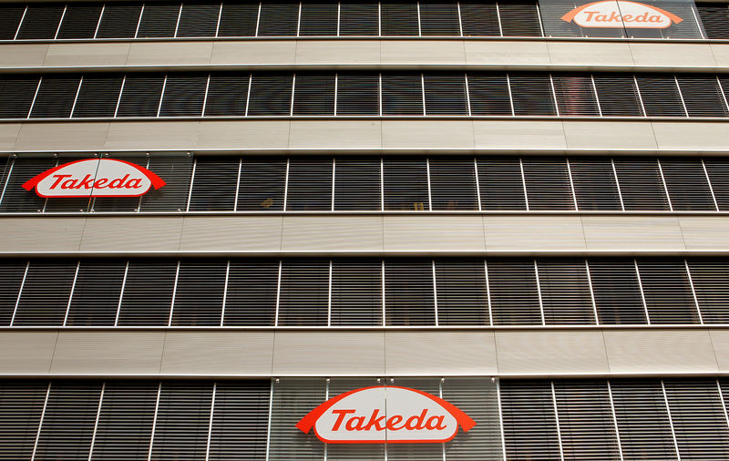 © Reuters. FILE PHOTO: Logos of Japanese Takeda Pharmaceutical Co are seen at an office building in Glattbrugg