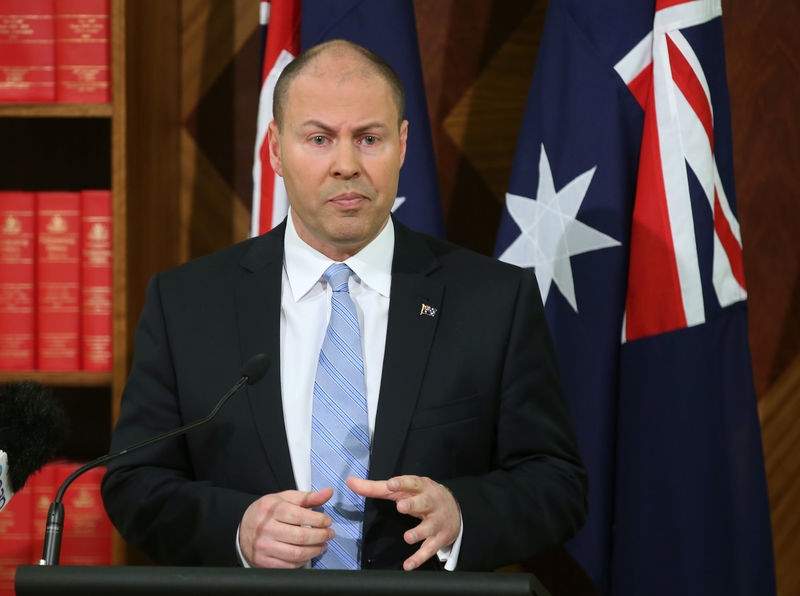 © Reuters. Australian Treasurer Josh Frydenberg speaks to the media during a press conference in Melbourne