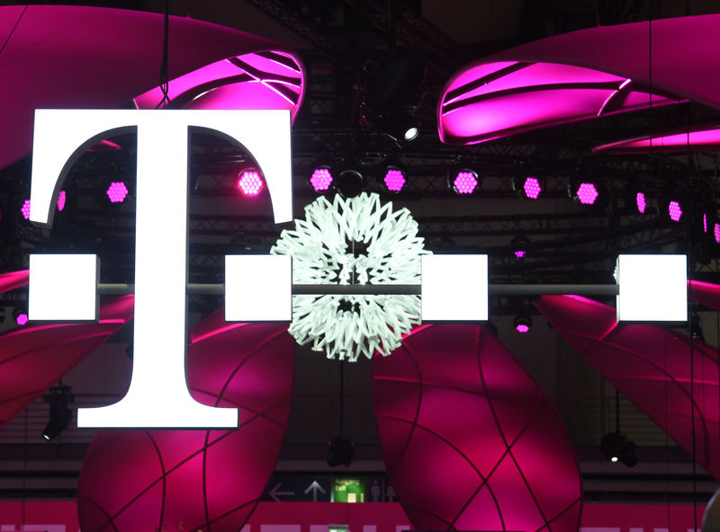 © Reuters. Deutsche Telekom logo is seen during preparations at the CeBit computer fair in Hanover