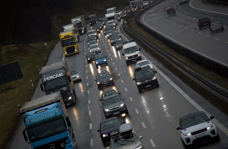 © Reuters. FILE PHOTO: Cars and trucks are stuck in traffic jam near Irschenberg