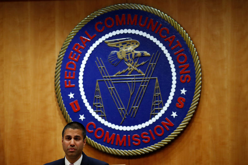 © Reuters. Chairman Ajit Pai speaks ahead of the vote on the repeal of so called net neutrality rules at the Federal Communications Commission in Washington