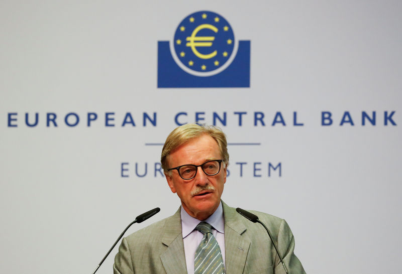© Reuters. FILE PHOTO: Yves Mersch, member of the Executive Board of the European Central Bank (ECB) presents the new 100- and 200-euro banknotes at the ECB headquarters in Frankfurt