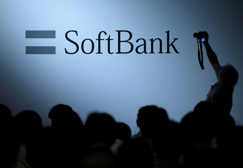 © Reuters. FILE PHOTO:  The logo of SoftBank Group Corp is displayed at SoftBank World 2017 conference in Tokyo